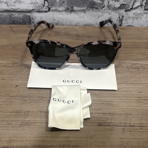 Gucci Accessories - EUC Gucci Round Black and Grey Sunglasses (GG0024S 009)